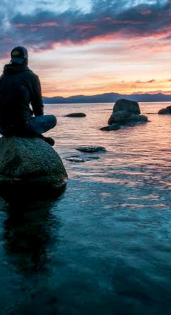 a boy looking sunset 